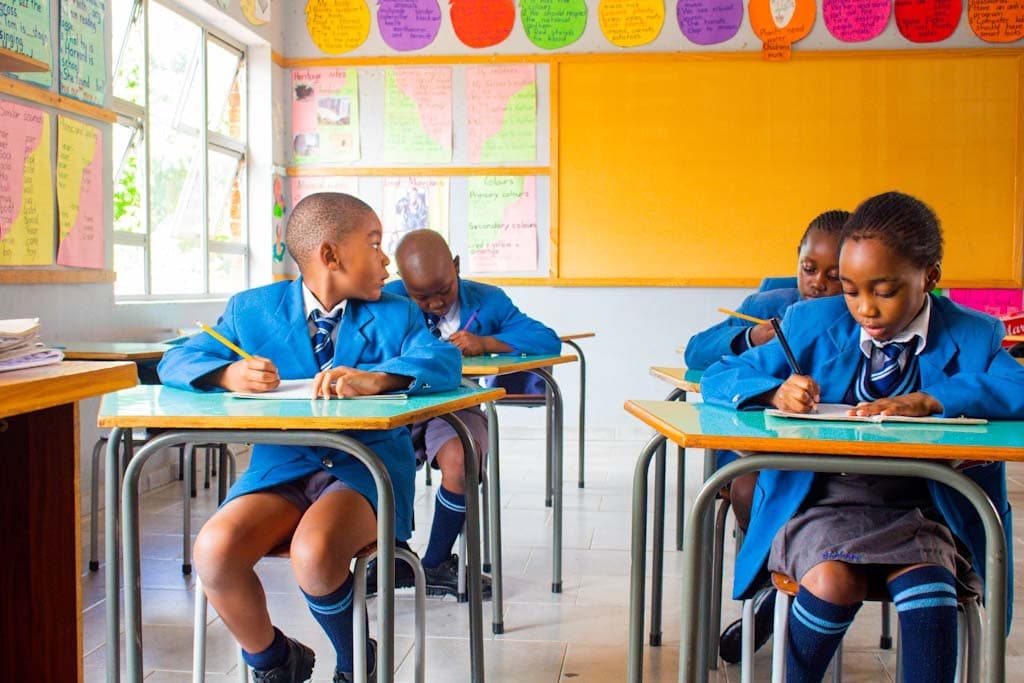 Students engaged in a Harvard Junior School classroom